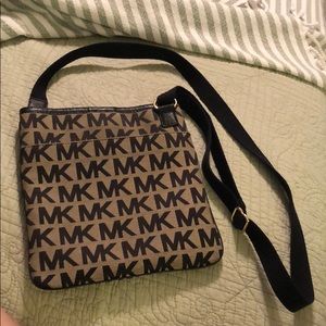 Authentic cross body Michael Kors purse